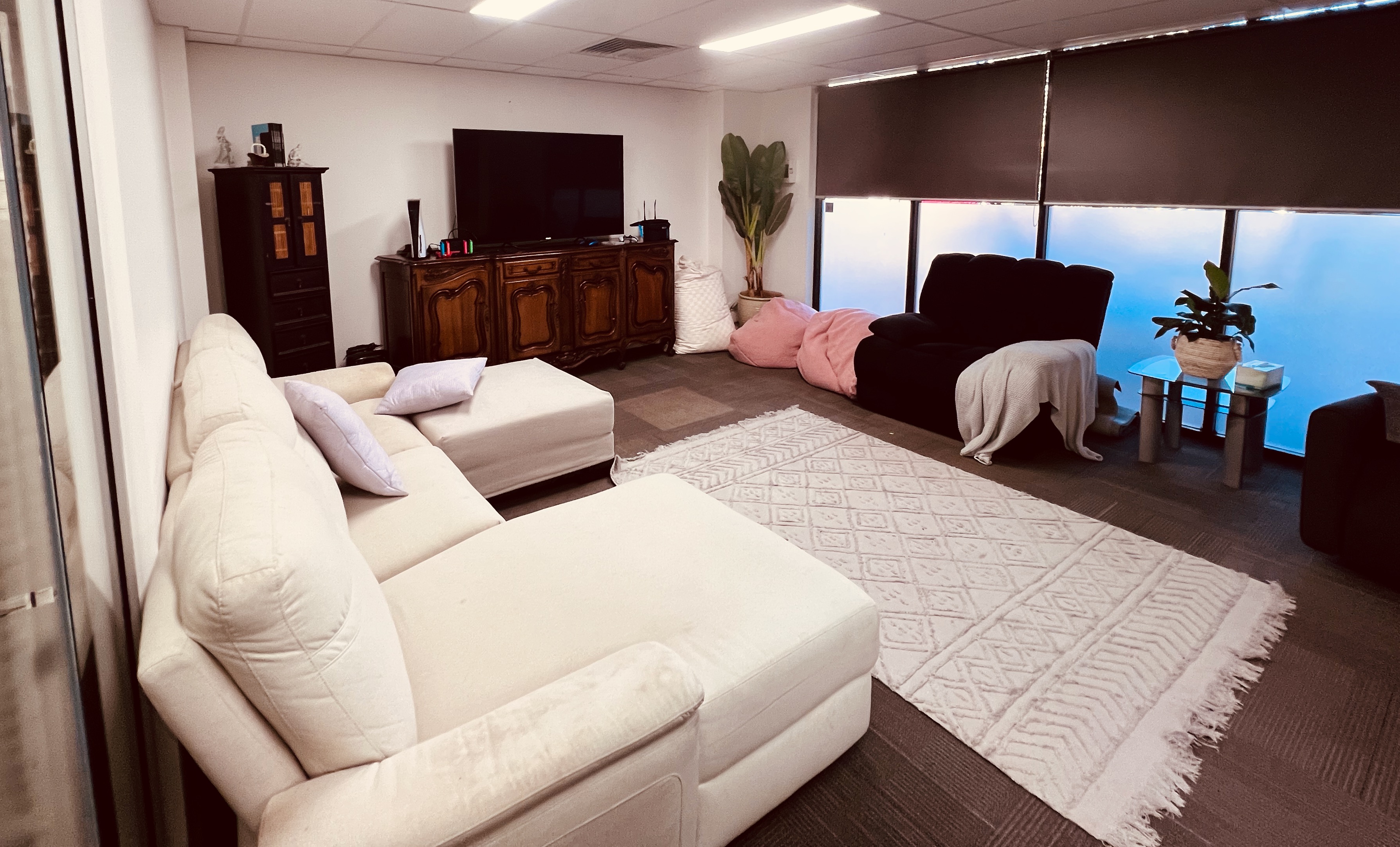 Quiet lounge area with comfy chairs and bookshelves